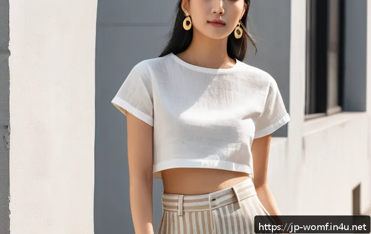 크롭탑과 하이웨이스트 코디 - A stylish young Japanese woman wearing a breathable linen blend cropped top in white, paired with hi...